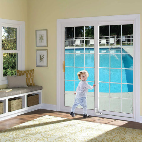Sliding Glass Door Lock And Bolt For Patio Doors Childproof Safety Rail Lock For Top Or Bottom Mount Fits Most Sliding Doors And Windows White 1 Pack Easy Install To Stop Drafts And Water Seepage installed on patio door with child nearby