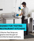 Worker using Chlorine Test Strips for Restaurants and Food Services at a commercial kitchen sink, emphasizing sanitizer testing