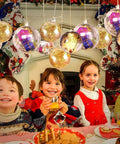 Children at a festive table with 10 Pcs 3.14 inch Filling Transparent Plastic Decorative Call DIY Craft Ball Transparent Ball