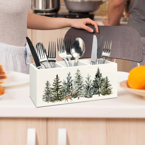 Christmas Tree Wooden Utensils Holder on kitchen countertop with reindeer and winter forest design, organizing utensils