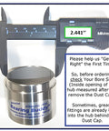 USA Made Chrome Plated Bearing Protector With 23B Bra And Blue Grease Indicator For 2.441 Inch Hubs shown with digital caliper