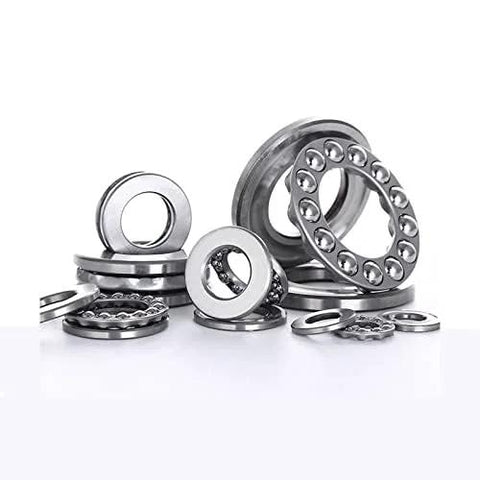 Four chrome steel thrust ball bearings, front view, 25x47x15 mm, ABEC3.