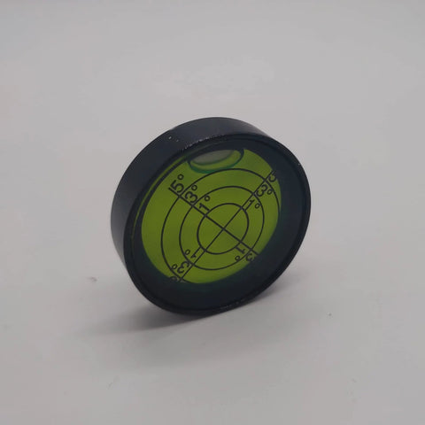 Pro grade aluminum bubble level with green liquid and black silver shell, 1.2 inch circle dial, high precision for builders and woodworking.
