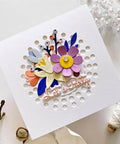 Card with Circular Dot Background Die for Card Making and Scrapbooking decorated with colorful flowers and text "Let's Party"