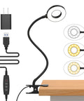 This clamp-on desk light with a 15.8 inch flexible silicone arm provides 3 color modes and 10 brightness levels for focused reading.