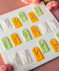 7 Piece Soft Clay Leaf Cutter Mold Set For Flower Stamps And Floral Earrings Making Tools Jewelry Craft Kit For DIY Artists Plastic Jewelry Molds For Flawless Impressions And Creative Workshops in white, orange, and green on a board