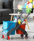 Cleaning trolley with two colored buckets and various cleaning supplies on heavy duty 3 inch caster wheels set of 4 with polyurethane steel wheels