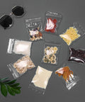 400 Pcs Clear 3x4 Inch Jewelry Bags 2 Mil Resealable Zip Bags for Small Business Storage Candy displayed with various contents