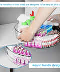 Clear 12 Inch Lazy Susan Turntable Set With Handles 4 Pack Acrylic Spinning Organizer in use, showing grip and storage capacity.