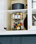 4 Pack 9.5 Inch Clear Acrylic Lazy Susan Turntable Organizer in kitchen cabinet with spice jars and condiments, two-tier spin storage