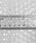 Clear bubble cushioning wrap with ruler, showing small three sixteenth inch bubbles. Bubble Cushioning Wrap For Fragile Items Perforated 12 Inch Roll 175 Ft