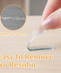 Hand removing a clear self-adhesive rubber bumper, demonstrating 10 Pack Clear Cabinet Door Bumpers Self Adhesive Rubber Cushions For Cabinets, Drawers, And Furniture Edges, Quiet No Squeak Protection, Scratch Guard, Easy Install, Transparent And Durable.