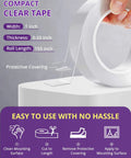 Heavy Duty Double Sided Tape Clear Removable Mounting Tape For Home Office Walls Decor Poster Hanging Carpet Automotive Trim DIY Projects Multipurpose Transparent Adhesive 155 Inch Long And 1 Inch Wide No Residue roll on table.