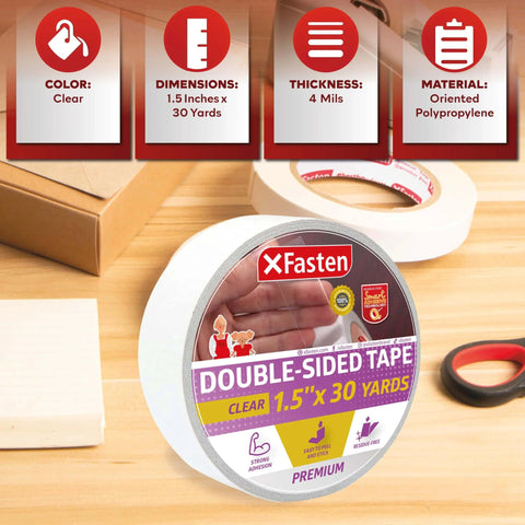 Clear Double Sided Tape Removable 1.5 Inch By 30 Yards shown on a table with packaging and crafting tools in background.
