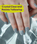 Close-up of hand peeling Extra Sticky Clear Double Sided Tape Removable Heavy Duty Mounting Tape 2 Inch By 20 Yards