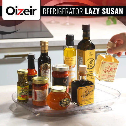 Two Pack Clear Rectangular Fridge Organizer Turntable Lazy Susan With 360 Degree Rotating Shelf holding various condiments