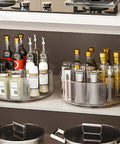 Rotating Makeup Organizer Turntable 11.5 Inch Large Cosmetic Storage With Five Dividers in pantry holding bottles and storage items.