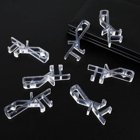 12 Pack Hidden Channel Valance Clips 1-7/8 Inch Clear Plastic Clips For Valance With Groove In Back on dark surface