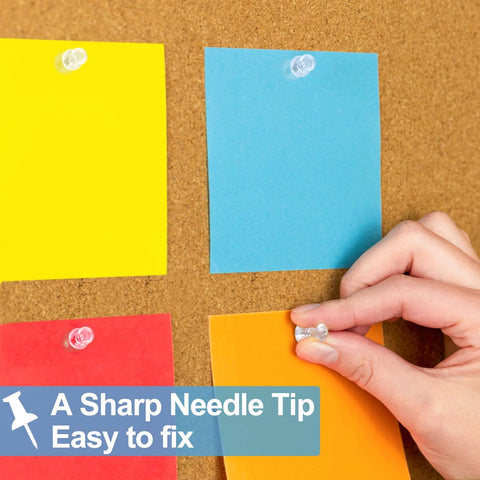 Hand pinning notes on a cork board with Clear Push Pins Set With Steel Point And Plastic Head, 2400 Pieces In 12 Boxes