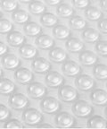 Clear Rubber Feet Adhesive Door Bumpers 300 Pack For Furniture And Cabinets, Sound Dampening Buffer Pads To Prevent Scratches And Slams, Noise Reduction, Easy Sticky Cushions, 8.5 By 2.5 Mm close-up view showing clear adhesive pads
