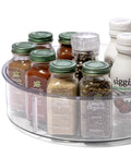 Round Turntable Organizer With Six Removable Clear Bins holding spices and bottles on a kitchen counter