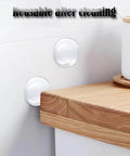 Protect walls and doors with 12 clear rubber bumper shields featuring self-adhesive backing; cushions door handles, absorbs shock