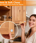 Woman installing 128 Pack Clear Rubber Cabinet Bumpers With Self Adhesive Silicone Pads For Cabinets Drawers And Doors Quiet Soft Close Anti Slam Protection That Will Not Scratch Wood Glass Metal Or Painted Surfaces