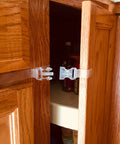 Self Adhesive Safety Latches For Baby And Adults installed on wooden cabinet doors, clear multi-use straps with four flaps, no tools required.