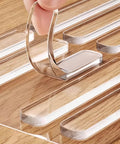 Clear Silicone Cabinet Door Bumpers, 10 Pack Self-Adhesive Noise Dampening Pads for Drawers and Furniture being applied to wood