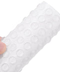 Set Of 100 Clear Self Adhesive Cabinet Door Bumpers 0.3 Inch Diameter Silicone Rubber Dots shown on roll