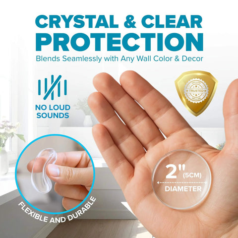 Person holding 2-inch clear STRONGEST HOME Wall Protector for Door Knobs, showing its flexible, durable rubber material.