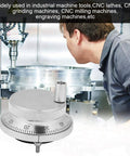 60mm Handwheel Manual Pulse Encoder With Four Terminals For CNC Control Systems, shown in front of industrial CNC machine