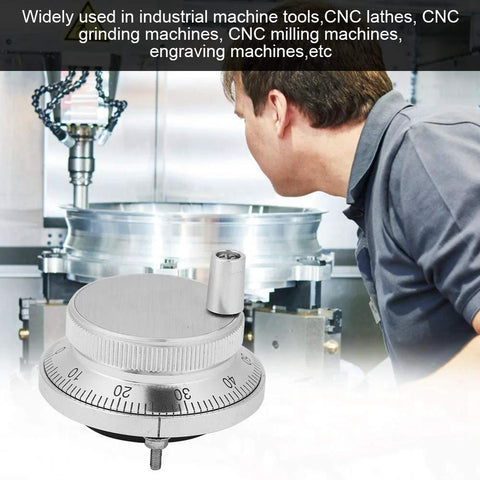 60mm Handwheel Manual Pulse Encoder With Four Terminals For CNC Control Systems, shown in front of industrial CNC machine