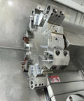 CNC lathe turret featuring Ten Pack M6 12mm 304 Stainless Steel Ball Coolant Nozzles with screw lock for precise coolant coverage