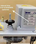 Close-up of Pro Grade Electric Intermittent Lubrication Pump for CNC machine tools showing interval settings and specifications.