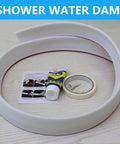 Collapsible Shower Threshold Water Dam, 39 In, Self Adhesive Shower Edge Water Barrier Stopper displayed with accessories on table.