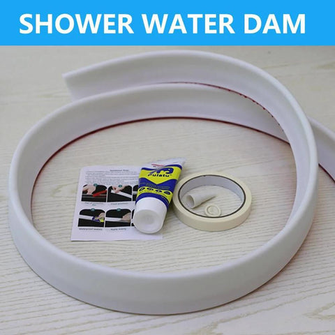 Collapsible Shower Threshold Water Dam, 39 In, Self Adhesive Shower Edge Water Barrier Stopper displayed with accessories on table.