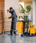 Beefed-Up Heavy Duty Commercial Cleaning Cart with 3 Shelves and Lid, Waste Bag Included, Side Mop and Broom Holders, in use