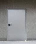 Commercial door fitted with Brinks Commercial 4 Pack Light Duty Keyed Door Entry Storeroom Lever Matte Black Reversible ANSI Grade 2 ADA