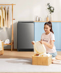 Compact 1.6 Cu Ft Portable Washing Machine With Wheels 11 Lb Capacity Fully Automatic Top Load Washer in home setting