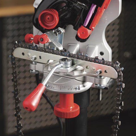 Close-up of a Professional Compact 120-Volt Bench Grinder And Universal Saw Chain Sharpener mounted with a saw chain for woodworking.
