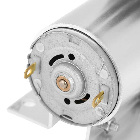Close-up of Compact DC 12V Mini Vacuum Pump motor end showing metal housing, part of the focus keyword: Compact DC 12V Mini Vacuum Pump Delivers 5 Liters Per Minute At 120 KPa Includes Holder Ideal For Gas Analysis Sampling And Lab Instrument Use Ultra Low Noise High Efficiency Diaphragm Pump For Precise Suction In Medical And Research Apps.