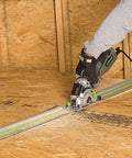 Person using 5.8 Amp Compact Circular Saw Kit With Laser Guide, Plunge Cut Depth Control, on a wooden board for precise cutting