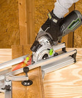 5.8 Amp Compact Circular Saw Kit With Laser Guide cutting wood, showing plunge cut depth control and miter base system in use.
