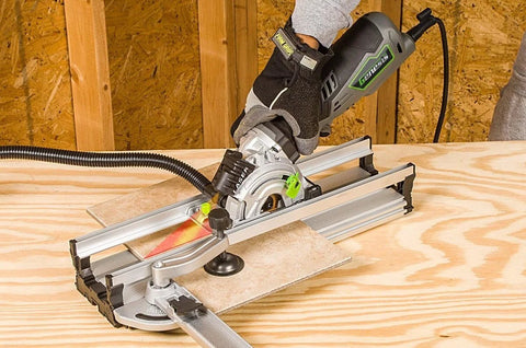 Using the 5.8 Amp Compact Circular Saw Kit with Laser Guide for precise wood cutting, featuring plunge cut depth control and miter base.