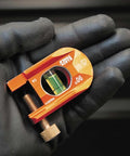 Compact 2.5 inch no-dog conduit bending level with 1 vial and ACCU-BEND design held in gloved hand