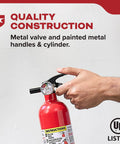 Hand holding multi purpose fire extinguisher 1A10BC for home office dorm and residential use, all metal construction.