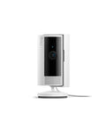 Compact indoor security camera captures crisp 1080p HD video with color night vision, live view, and real time motion alerts on stand
