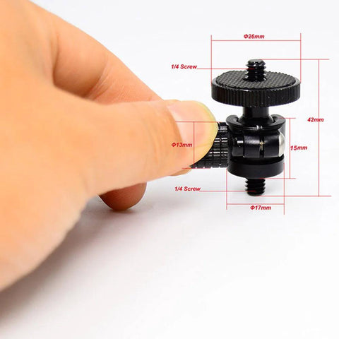 Compact Mini Ball Head Tripod Mount With One Quarter Inch Screw Connector showing measurement details and hand for scale.