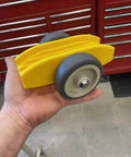 Compact Plywood And Drywall Dolly For Moving Panels And Drywall Carts By Plywheels Portable Panel Carrier Rolls Any Material That Fits In The Slots Great For Onsite Construction Jobs Lightweight Handy Tool For Quick Roll And Load, held in hand in workshop